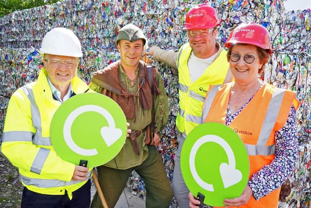 Robin Hood will be encouraging residents to go green this September. Councillor Neil Clarke MBE Cabinet Member for Transport and Environment, Robin Hood, Cllr Mike Adams deputy transport and environment and Julia Adams contract performance manager at Veolia.