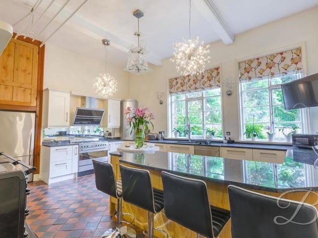 It might be a mansion dating back to the Victoran era, but its gorgeous, glossy kitchen belongs firmly in the modern-day world. It comes complete with an integrated oven with five-ring gas hob, wine fridge, storage cupboards, TV point and ample worktop space.