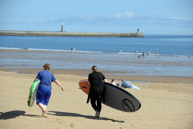 Meanwhile, paddle boarders took straight to the North Sea to cool off during the heatwave.