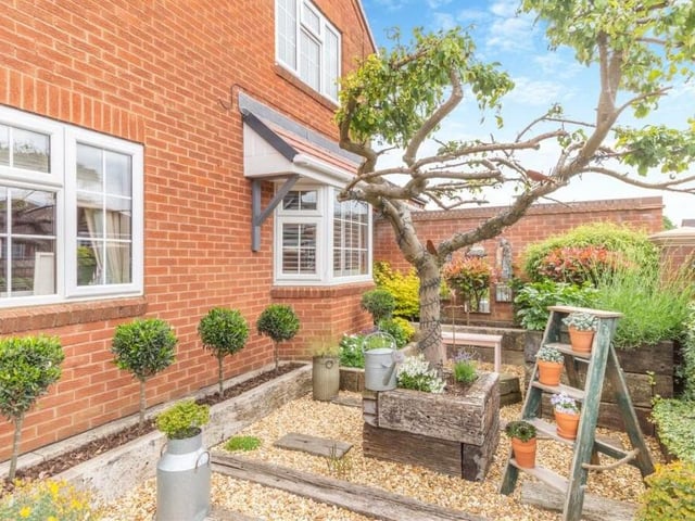 The garden delights even extend to the side of the £465,000 Sutton property.