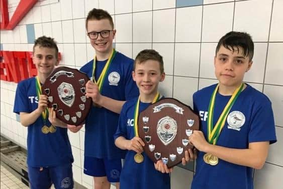 Sutton's 12-and-under boys' team who won two top trophies at the relay county championships.