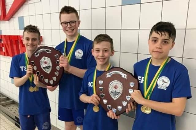 Sutton's 12-and-under boys' team who won two top trophies at the relay county championships.