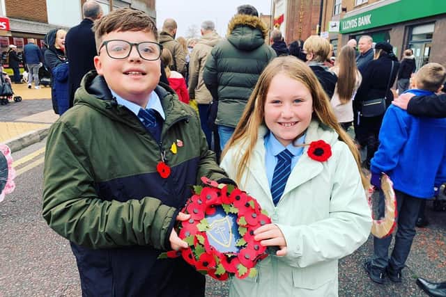 The Ofsted report praised the children at St Mary's for being respectful towards Remembrance Day. These two pupils were chosen to lay a wreath at a service in town.