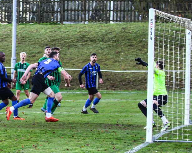 Jobe Shaw heads home Shedrwood's second goal.