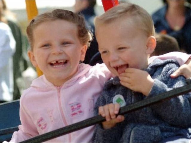 Chloe Green and her brother Alex enjoy the funfair.