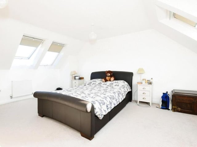This is the master bedroom, which sits on the third floor of the Kirkby house. Roof windows ensure plenty of natural light in what is a spacious room.