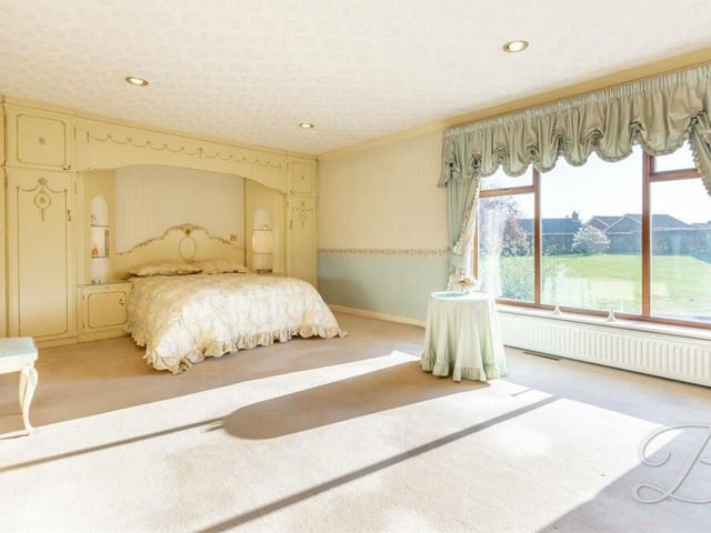It's bedroom time now, starting with the main one, which includes fitted wardrobes and an abundance of space to make the best use of. The large window overlooks the back garden