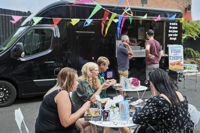 Customers enjoying their exotic fish and chips