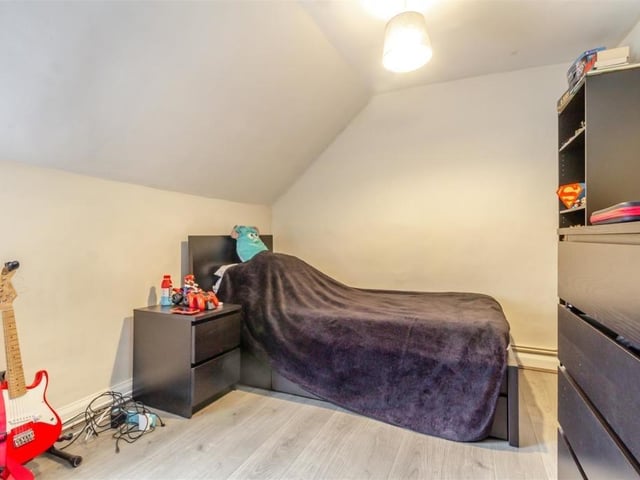 This bedroom at the Whitwell property has plenty of space for storage.