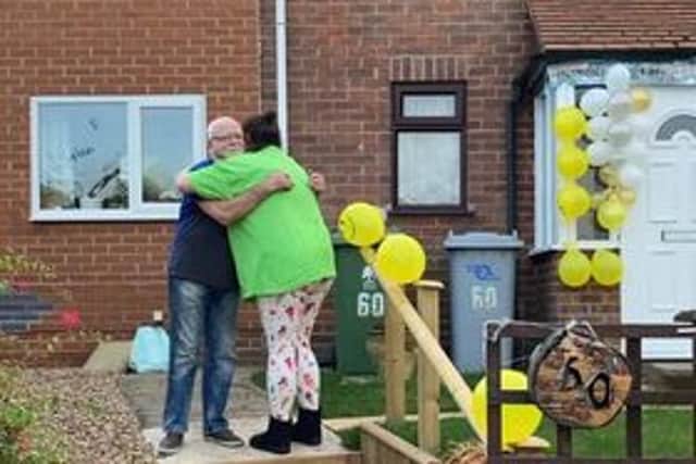Elinore returned from the pageant to find her house decorated with bunting and balloons by her Dad John