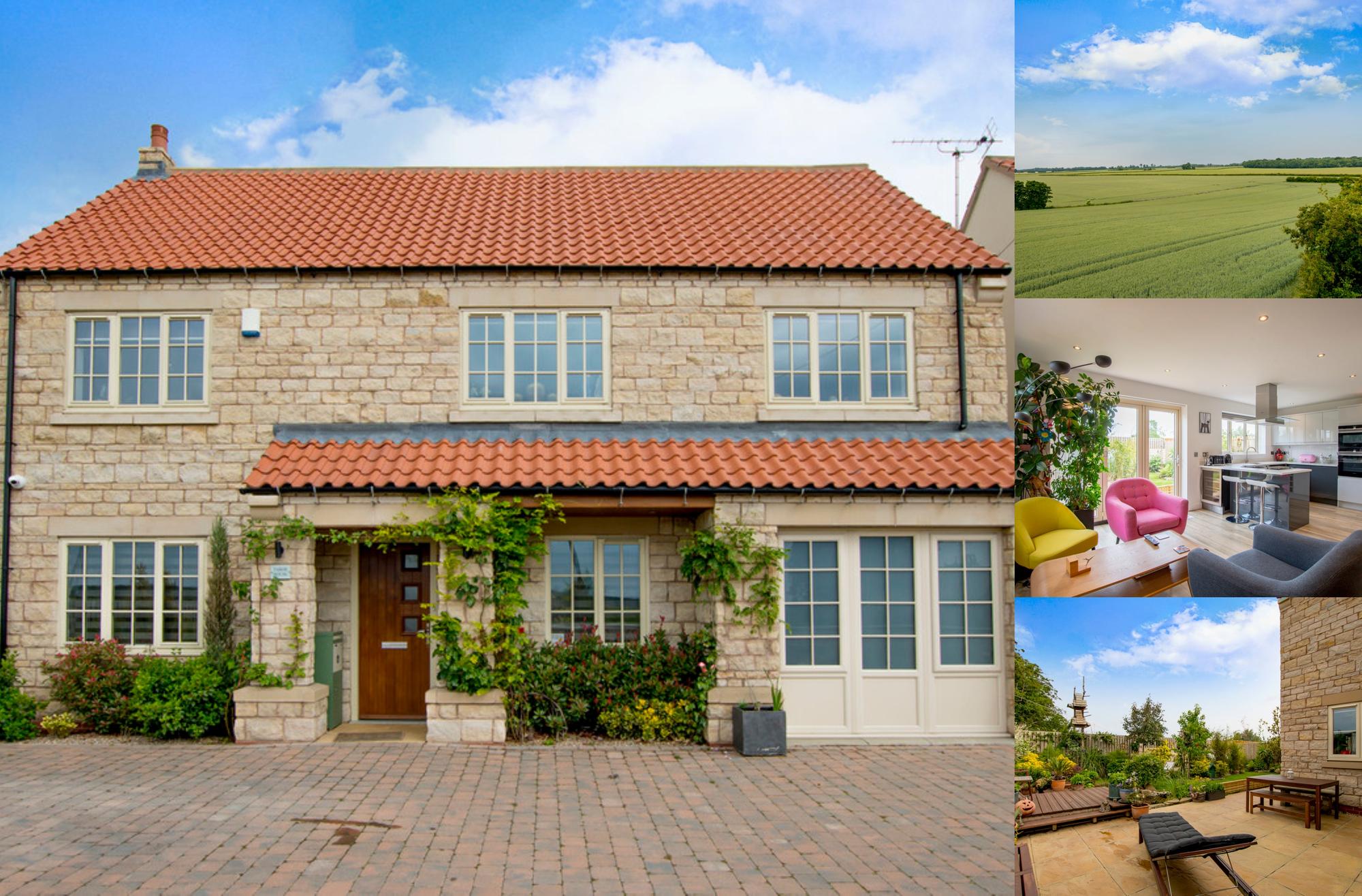 Tabor House in Marr, has five bedrooms, a modern open plan living area and a seperate lounge with a wood burning stove.