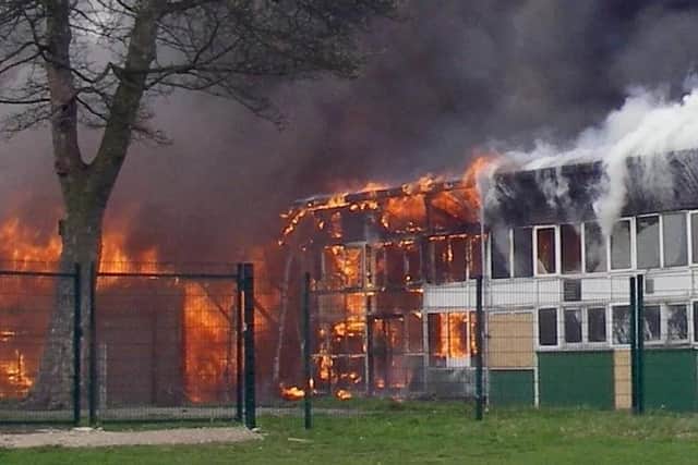 Fire rips through old and empty buildings at the former Sherwood Hall School in 2011. Now 52 new homes could be built on the the school's disused playing fields.