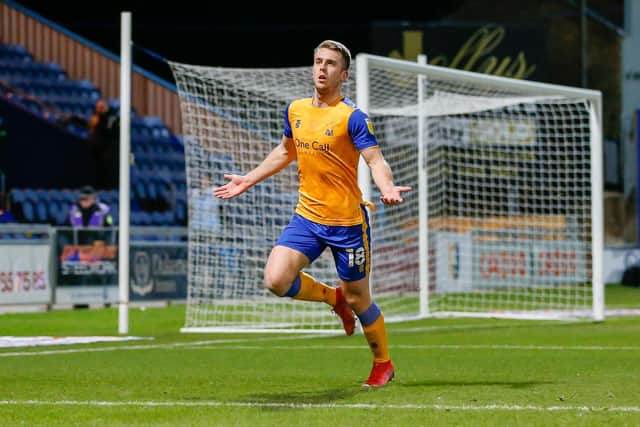 Rhys Oates celebrates his stunner against Colchester.