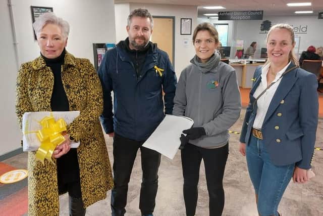 Laura Gapski (third from left) of the Bright Sparks Private Day Nursery with fellow campaigner Daniel Nightingale. They went to hand over the petition against the proposed housing development on Cauldwell Road in Sutton. Also handing over a petition, at the same time, were Hucknall Against the Whyburn Farm development campaign group members Mandy Shaw (left) and Jemma Chambers (right).