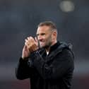 Ian Evatt acknowledges the fans after the Carabao Cup Third Round match between Arsenal and Bolton Wanderers at Emirates Stadium on September 25, 2024 in London, England. (Photo by Alex Pantling/Getty Images)
