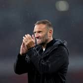 Ian Evatt acknowledges the fans after the Carabao Cup Third Round match between Arsenal and Bolton Wanderers at Emirates Stadium on September 25, 2024 in London, England. (Photo by Alex Pantling/Getty Images)
