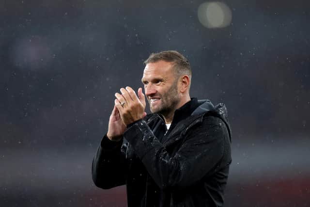Ian Evatt acknowledges the fans after the Carabao Cup Third Round match between Arsenal and Bolton Wanderers at Emirates Stadium on September 25, 2024 in London, England. (Photo by Alex Pantling/Getty Images)