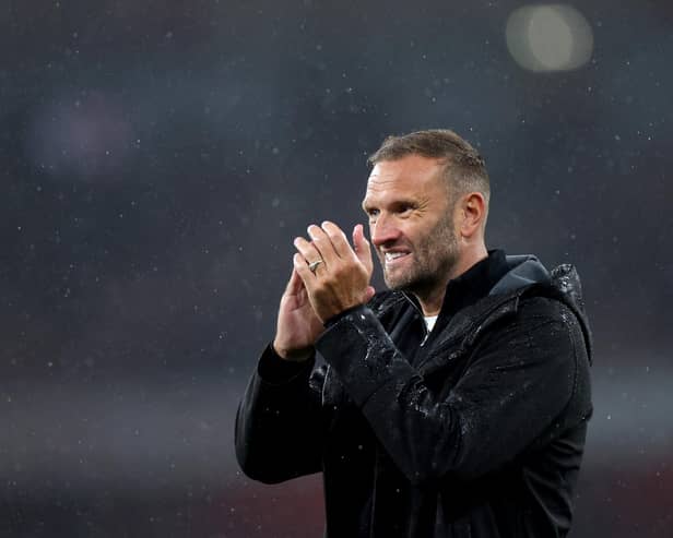 Ian Evatt acknowledges the fans after the Carabao Cup Third Round match between Arsenal and Bolton Wanderers at Emirates Stadium on September 25, 2024 in London, England. (Photo by Alex Pantling/Getty Images)
