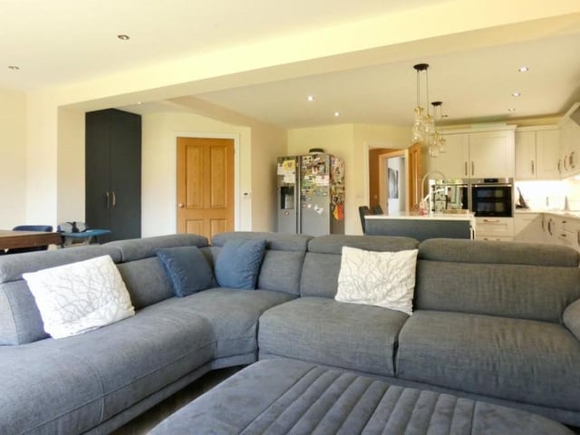 Once you've had your meal, simply relax on the sofa in front of the telly. This is the living area attached to the kitchen.