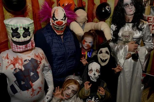 Kirsty, Evie, Lexi, Lacey, Kian, Olly and Angel at their spooky Halloween house maze in Kirkby, raising money for a defibrillator