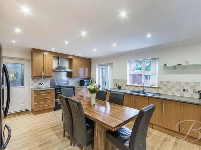 This area also lends itself as a dining area with space for a dining table and chairs. The room further benefits from the sitting room area, providing ample space for socialising with family and friends. Windows and double doors to the rear elevation.
