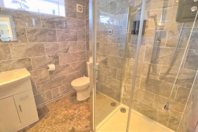 Recently fitted on the ground floor by the current owners is this sparkling shower room. It has a contemporary, two-piece suite, fully tiled walls and underfloor heating.