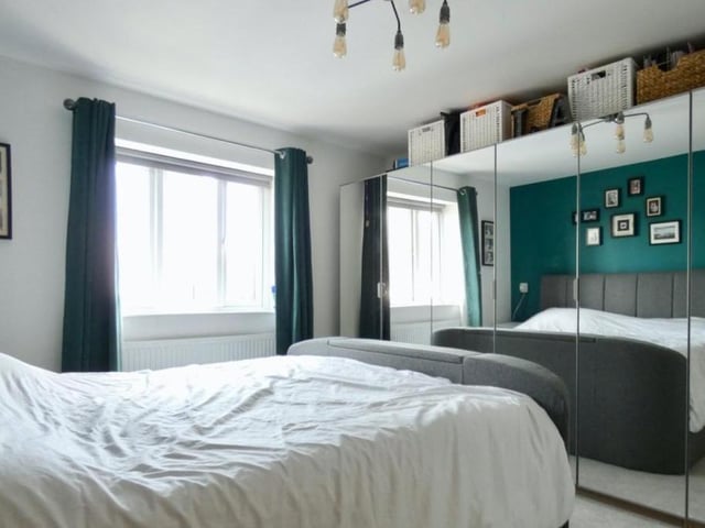 Moving upstairs now, and we take a look at the master bedroom. It has wardrobe space aplenty.