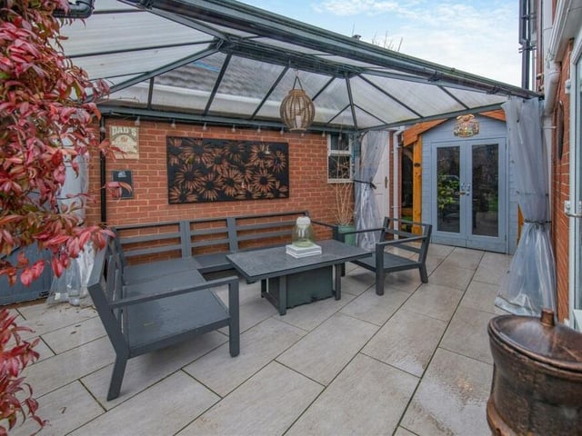 This porcelain paved patio provides part of a perfect, private entertaining area, ideal for hosting family gatherings, summer parties or barbecues.