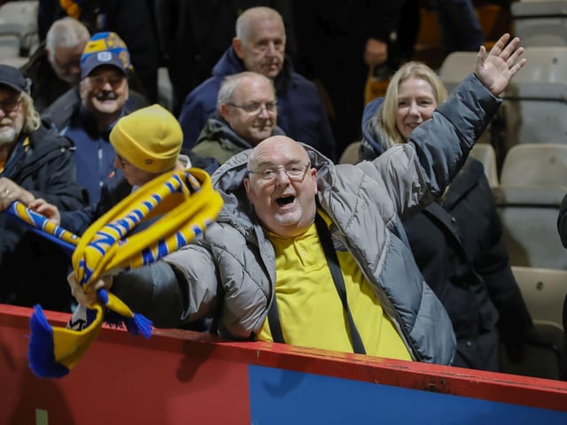 Mansfield Town progressed in the FA Cup thanks to Stephen McLaughlin's second half goal.