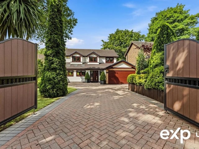 The striking exterior is defined by a charming façade with elegant touches and up-to-date finishes. A gated entrance opens onto a wide, smartly block-paved driveway with plenty of parking for numerous vehicles to the front and an integral double garage.