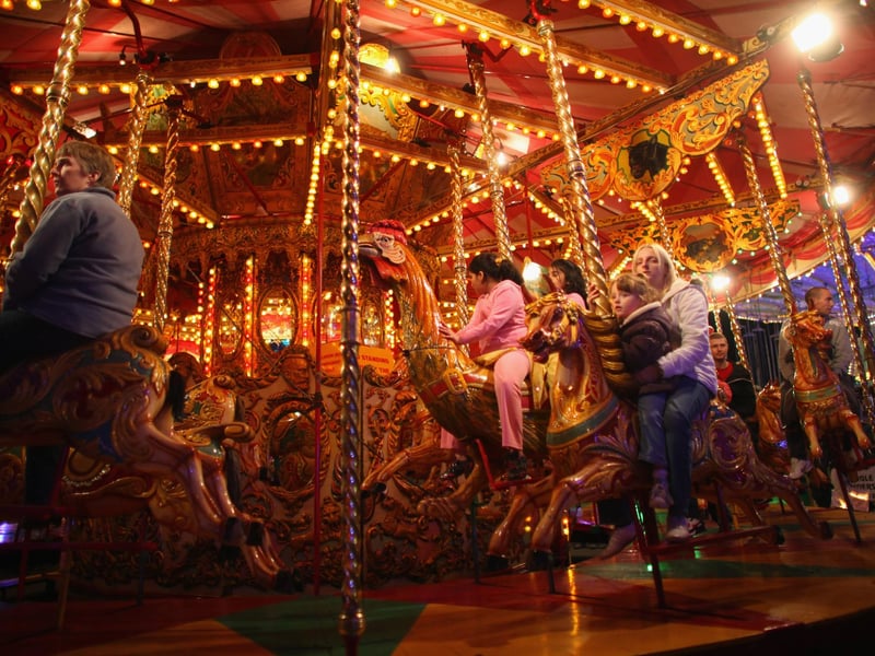 Riders enjoy the carousel ride in 2010.