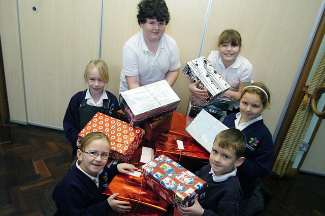 Pupils from Hatfield Crookesbroom Primary School have put together shoeboxes for the Doncaster Free Press troops appeal in 2009. Pictured are back l-r Abbie Webster, eight, Benjamiun Black, nine, Lizzie Colcombe, ten and Kirsten Howe, nine. Front l-r Melissa Dudley, seven and Leon Davison, seven.