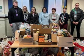 Pictured; Meden College students alongside Liz Phillips of Lifespring Church and Meden School's Kate Kinney. Bags and boxes of donations were delivered to Warsop Town Hall.