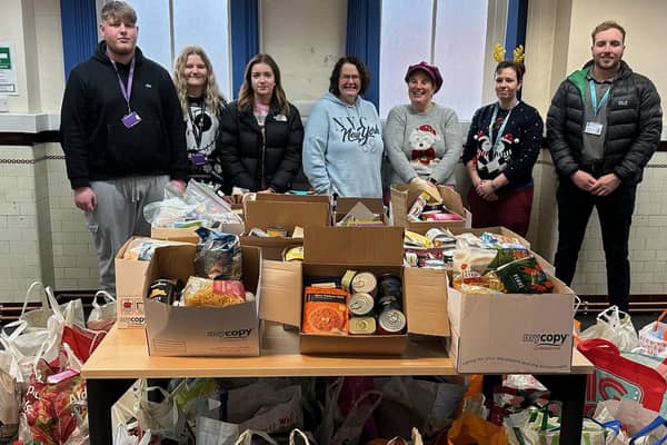 Pictured; Meden College students alongside Liz Phillips of Lifespring Church and Meden School's Kate Kinney. Bags and boxes of donations were delivered to Warsop Town Hall.