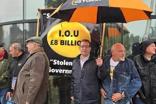 Mick Newton (centre) has been campaigning to bring justice to mineworkers and their widows regarding pension payments for over a decade. Photo: Submitted