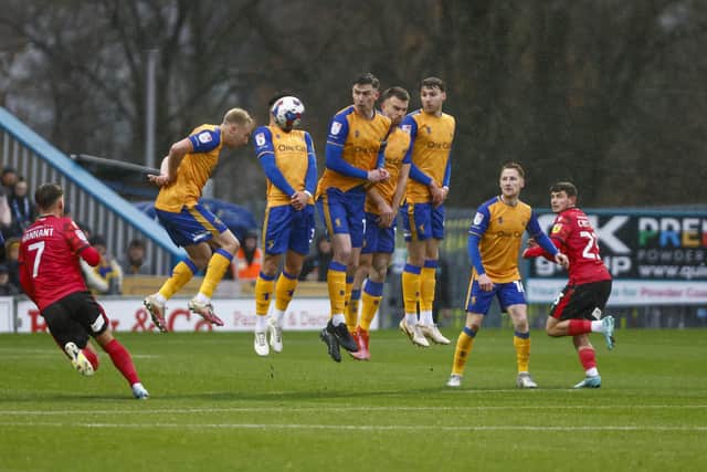 Stags' wall fails to keep out an early Colchester free kick. Photo credit Chris Holloway / The Bigger Picture.media