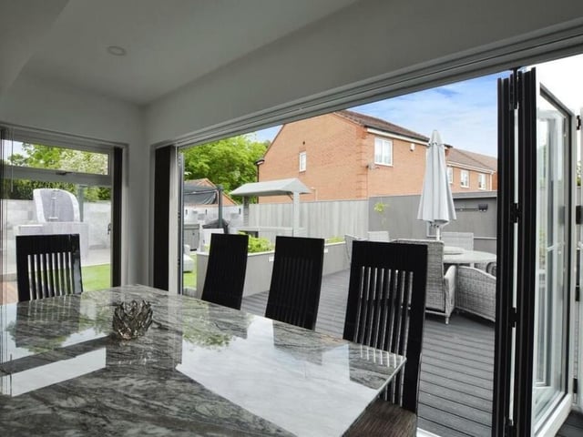 Here is a close-up of the dining area, which is part of the kitchen'diner at the Mansfield bungalow. As you can see, it opens out on to the decked area of the back garden.