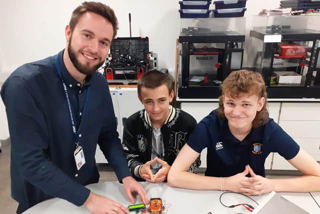 Jan-Hendrik with Intermediate Certificate in Engineering students Riley Bowles and Rhys Woodcock