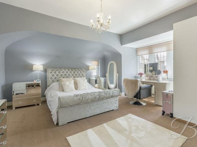 The main bedroom is the largest. It is so spacious there is room for all kinds of bedroom furniture, while a cupboard provides additional storage. A bay window overlooks the front of the £575.000-plus house.