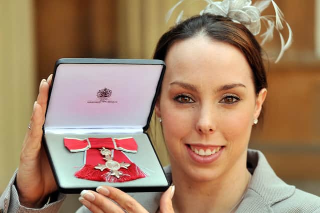 Olympics star Beth Tweddle poses with her MBE.