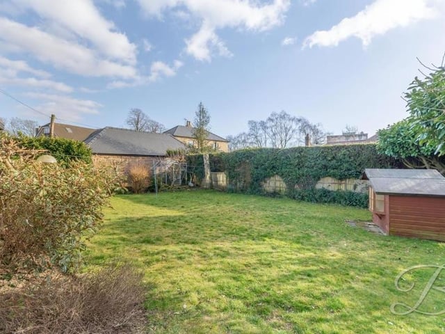 The rear garden is the ideal spot for summer parties and barbecues.