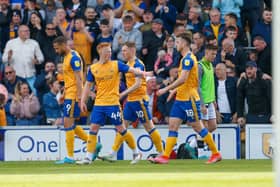 Stags confirmed the play-off match against Northampton with a 2-2 draw against Forest Green Rovers.