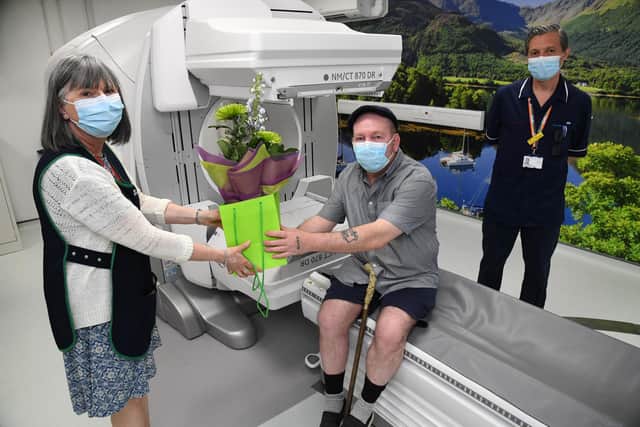Les Trueman becomes the first patient to use King's Mill Hospital's new gamma scanner. He is pictured with Jill Smallwood and Robert Bradley.