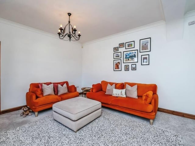 Although cosy and comfortable, the main living room also boasts plenty of space.