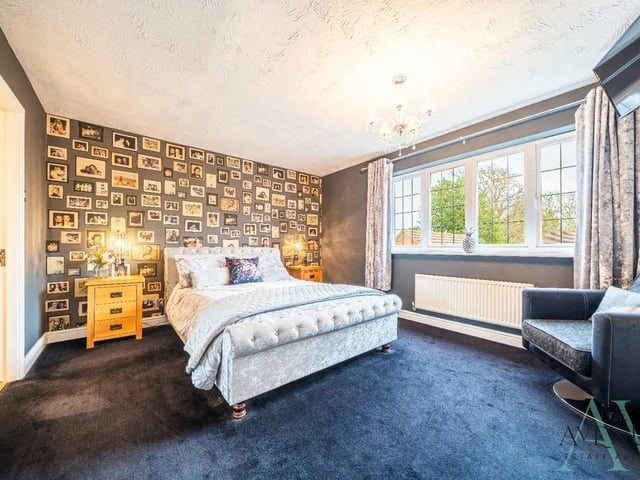 This bedroom features fitted wardrobes and an en-suite.