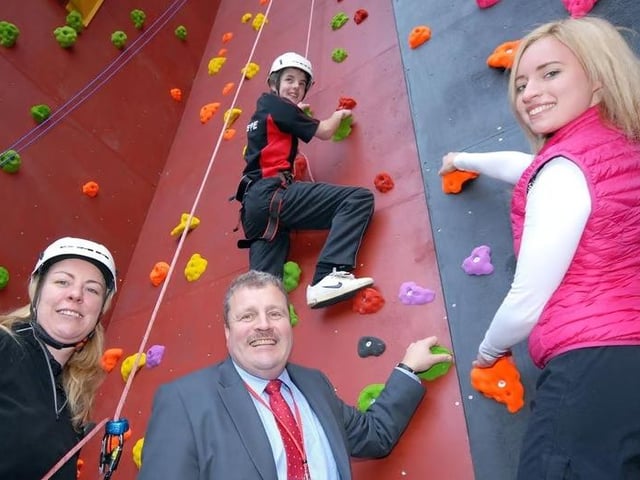 Back in 2011, the school climbing wall at the Samworth Church Academy was officially opened by Bonita Norris with Principal Michael Griffiths, P.E. teacher Morag Rogers who was the lead teacher for outdoor education and then Year 11 pupil Michael Hawkins who tried out the new facility.