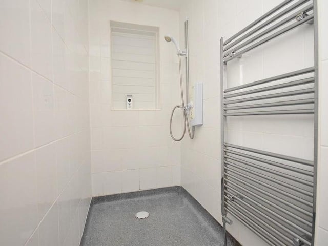 Not many properties boast their own wet room, but here's a practical addition to the Dover Beck Close home. It includes an electric shower, heated towel-rail, tiled walls, extractor fan and vinyl floor covering.