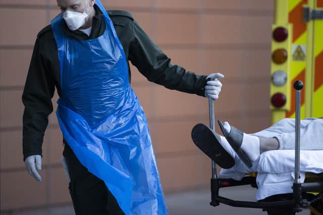 A patient arrives at a hospital in London, where more than 180 Covid deaths were recorded in a single day  (Photo by Dan Kitwood/Getty Images)
