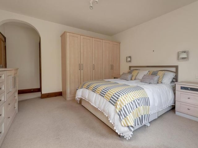 This bedroom is also a good size, with space for wardrobes. There are two bedside light points, and double-glazed windows overlooking the back of the Croft Avenue property.