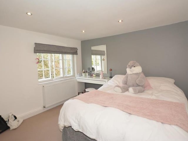 The other three bedrooms on the first floor are of a similar size. All are bright and face the front of the former farmhouse.